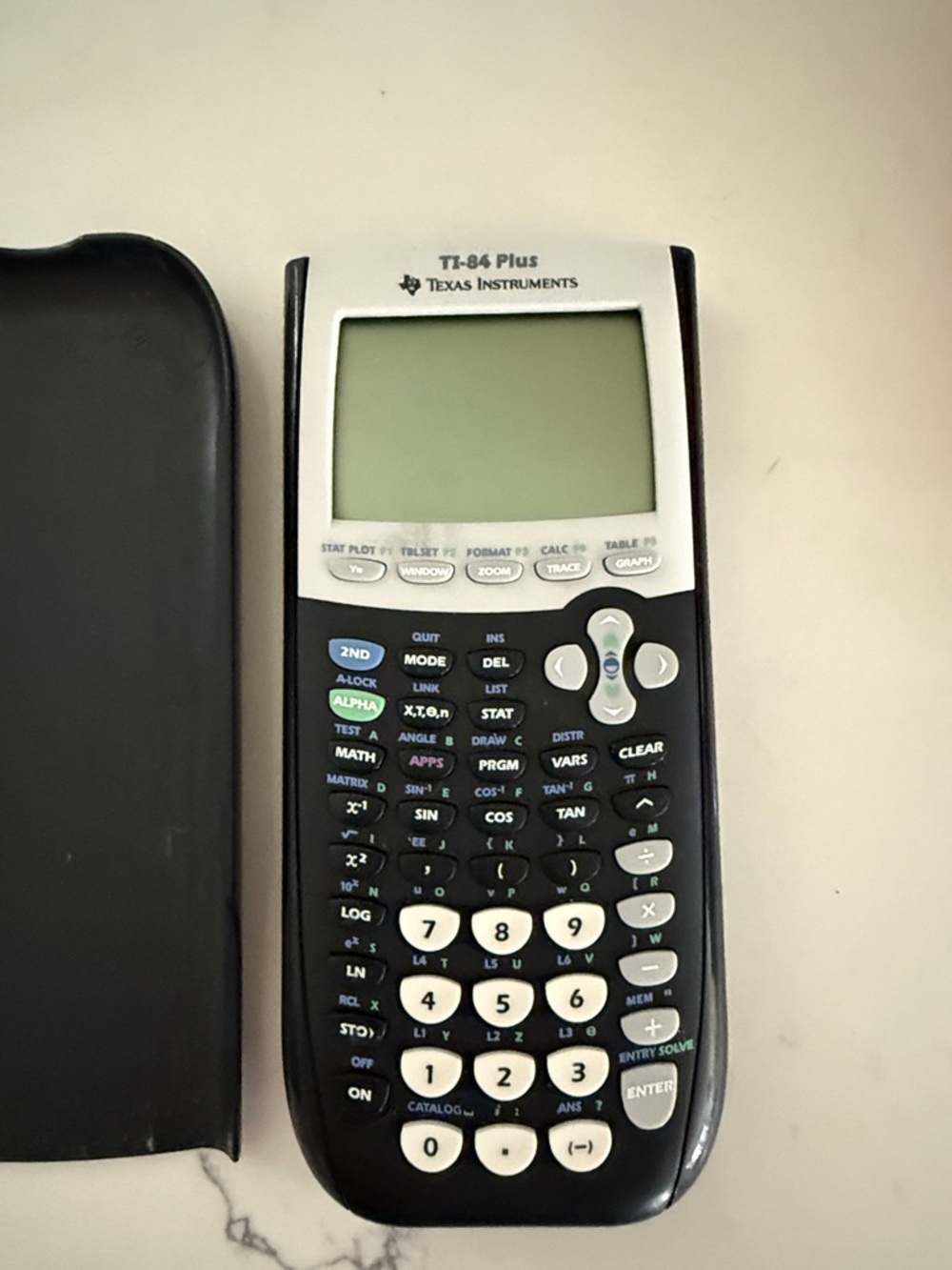 Texas Instruments TI-84 Plus Graphing Calculator in Black and White